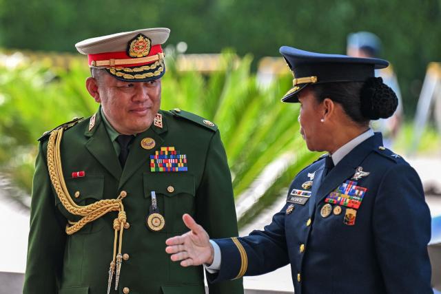 Myanmar’s Defence Attache to the Philippine Tun Tun San (L) arrives to attend the opening ceremony of the 20th Association of Southeast Asian Nations (ASEAN) Defence Ministers' Meeting in Cebu, central Philippines on October 28, 2026. (Photo by Jam STA ROSA / POOL / AFP)