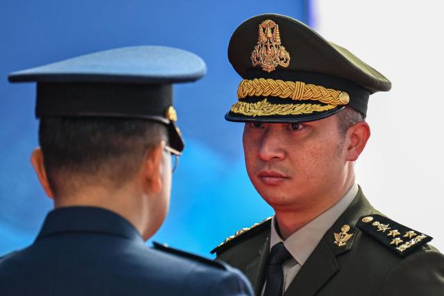 Cambodia’s Defence State Secretary Rath Dararoth (R) arrives to attend the opening ceremony of the 20th Association of Southeast Asian Nations (ASEAN) Defence Ministers' Meeting in Cebu, central Philippines on October 28, 2026. (Photo by Jam STA ROSA / POOL / AFP)