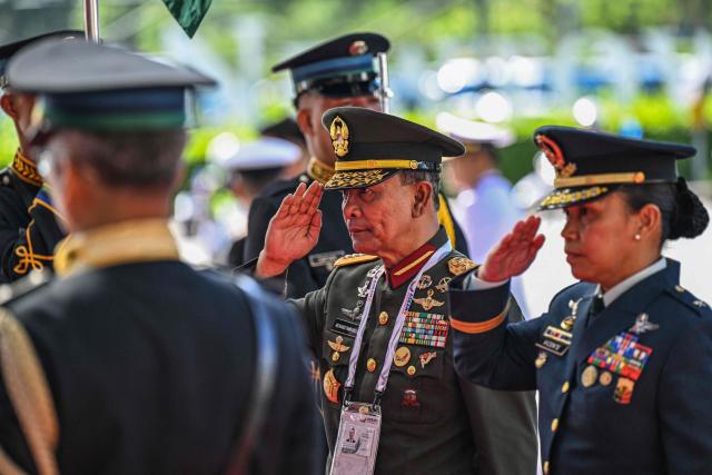 Indonesia’s Defence Vice Minister Richard Tampubolon (C) arrives to attend the opening ceremony of the 20th Association of Southeast Asian Nations (ASEAN) Defence Ministers' Meeting in Cebu, central Philippines on October 28, 2026. (Photo by Jam STA ROSA / POOL / AFP)