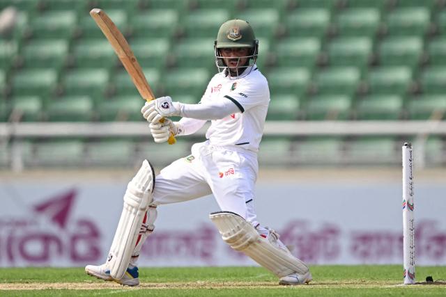 Bangladesh's Mominul Haque plays a shot during the first day of the first test cricket match between Bangladesh and West Indies at the Sher-e-Bangla National Stadium in Mirpur on October 28, 2026. (Photo by Salahuddin Ahmed / AFP)