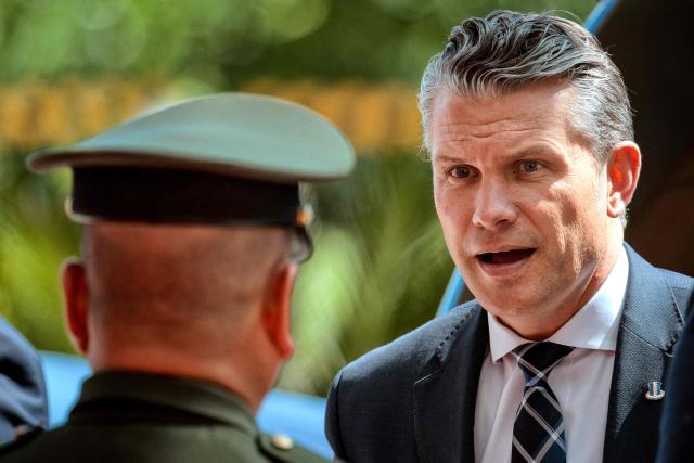 US Defence Secretary Pete Hegseth (R) arrives for the Association of Southeast Asian Nations (ASEAN) Defence Ministers' Informal Meeting with the United States in Cebu, central Philippines, on October 28, 2026. (Photo by Ezra Acayan / POOL / AFP)