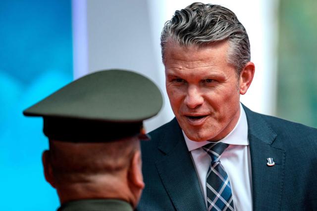 US Defence Secretary Pete Hegseth (R) arrives for the Association of Southeast Asian Nations (ASEAN) Defence Ministers' Informal Meeting with the United States in Cebu, central Philippines, on October 28, 2026. (Photo by Ezra Acayan / POOL / AFP)