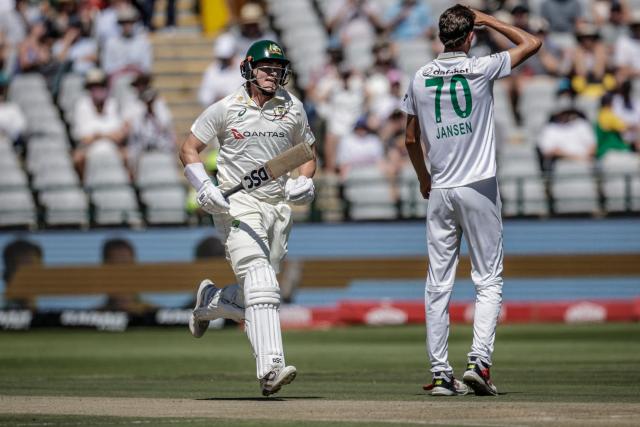 South Africa's Marco Jansen (R) reacts as Australia's Matt Renshaw (L) runs between the wickets on day two of the third Test match between South Africa and Australia at Newlands stadium in Cape Town on October 28, 2026. (Photo by Marco Longari / AFP)