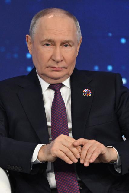Russian President Vladimir Putin attends the Russia-Africa economic and humanitarian forum at the Gostiny Dvor conference centre in central Moscow on October 28, 2026. (Photo by Igor IVANKO / POOL / AFP)