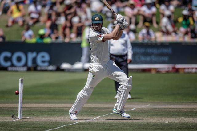 Australia's Cameron Green watches the ball after playing a shot on day two of the third Test match between South Africa and Australia at Newlands stadium in Cape Town on October 28, 2026. (Photo by Marco Longari / AFP)