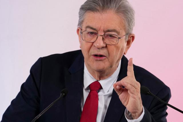 Leftist party La France Insoumise (LFI) candidate in France's 2027 presidential election Jean-Luc Melenchon gestures as he addresses the audience during a press conference in Paris on October 28, 2026. (Photo by Dimitar DILKOFF / AFP)