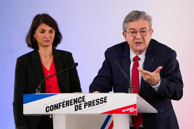 Leftist party La France Insoumise (LFI) candidate in France's 2027 presidential election Jean-Luc Melenchon (R) gestures next to La France Insoumise - Nouveau Front Populaire's MP Aurelie Trouve as he addresses the audience during a press conference in Paris on October 28, 2026. (Photo by Dimitar DILKOFF / AFP)