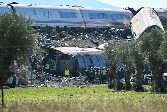 Emergency services work at the site of a train collision between a high speed Renfe AVE train and Iryo train around 150kms south of Madrid between Urda and Los Yebenes in the province of Toledo, on October 28, 2026. (Photo by Javier SORIANO / AFP)