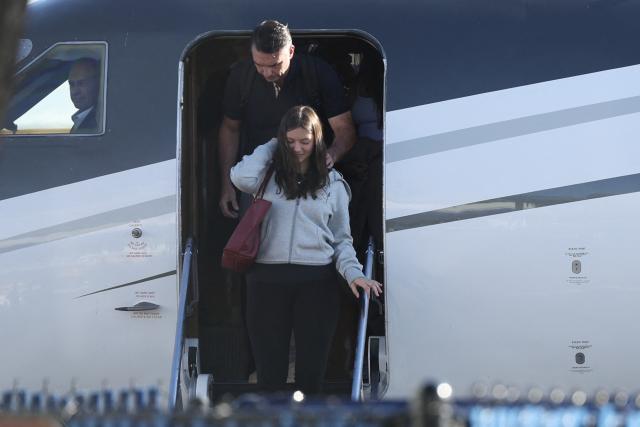 TOPSHOT - Flavio Bolsonaro steps off a plane after arriving at Opa Locka Executive Airport in Miami, Florida on October 28, 2026. Brazil's defeated right-wing presidential candidate Flavio Bolsonaro stepped out of a private plane in Florida today, AFP witnessed, despite a court order banning him from leaving his country. His plane touched down at Opa-Locka Executive Airport outside Miami after flying from Argentina with a stopover in Ecuador, as speculation had swirled for days over his whereabouts. (Photo by Ricardo Arduengo / AFP)
