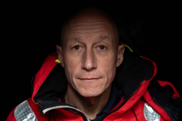 French skipper Armel Tripon poses aboard his Imoca class monohull “Les p’tits Doudous“ before the start of the 13th Route du Rhum Destination Guadeloupe on October 28, 2026. From Saint-Malo in Brittany to Pointe-a-Pitre in Guadeloupe, over 100 skippers across 6 classes will take the start on November 1, 2026, in this solo transatlantic sailing race. (Photo by Sebastien Salom-Gomis / AFP)