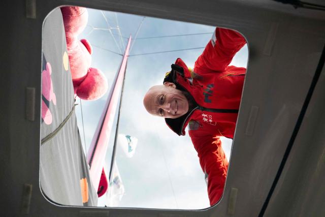 French skipper Armel Tripon poses aboard his Imoca class monohull “Les p’tits Doudous“ before the start of the 13th Route du Rhum Destination Guadeloupe on October 28, 2026. From Saint-Malo in Brittany to Pointe-a-Pitre in Guadeloupe, over 100 skippers across 6 classes will take the start on November 1, 2026, in this solo transatlantic sailing race. (Photo by Sebastien Salom-Gomis / AFP)