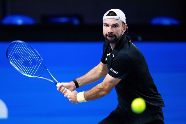 Austria's Jurij Rodionov returns the ball to Georgia’s Nikoloz Basilashvili (not pictured) during the Erste Bank Open 2026 ATP 500 tennis tournament in Vienna, Austria, on October 28, 202 (Photo by GEORG HOCHMUTH / APA / AFP) / Austria OUT