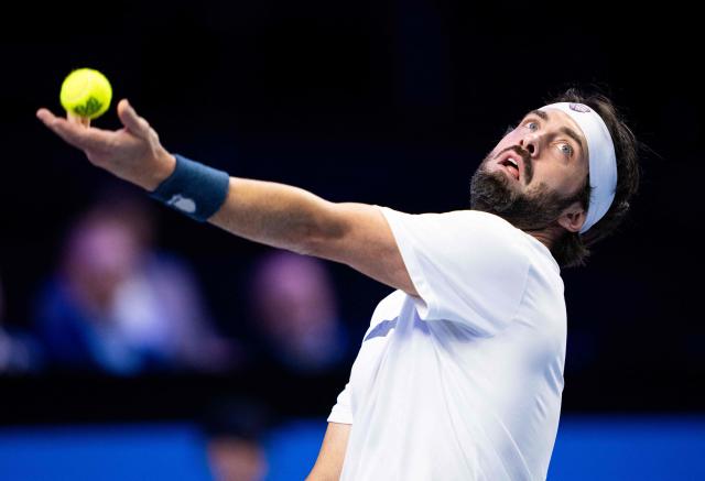 Georgia’s Nikoloz Basilashvili serves the ball to Austria's Jurij Rodionov (not pictured) during the Erste Bank Open 2026 ATP 500 tennis tournament in Vienna, Austria, on October 28, 202 (Photo by GEORG HOCHMUTH / APA / AFP) / Austria OUT