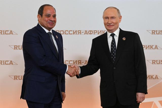 Russian President Vladimir Putin greets Egypt’s President Abdel Fattah Al-Sisi during a welcoming ceremony for participants of the Russia-Africa summit at the Grand Kremlin Palace in central Moscow on October 28, 2026. (Photo by Igor IVANKO / POOL / AFP)
