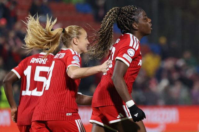 Bayern Munich's Spanish forward #29 Edna Imade (R) celebrates scoring the 1-2 goal with her teammates during the UEFA Women's Champions League - League phase, Matchday 3 - football match between FC Bayern Munich and Real Madrid in Unterhaching near Munich, southern Germany, on October 28, 2026. (Photo by Alexandra BEIER / AFP)