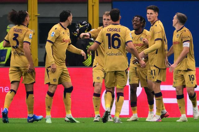 Bologna’s Belgian forward #11 Samuel Mbangula (3R) with teammates celebrates after scoring his second goal during the Italian Serie A football match between AC Milan and Bologna at the San Siro stadium in Milan, northern Italy on October 28, 2026. (Photo by Marco Bertorello / AFP)