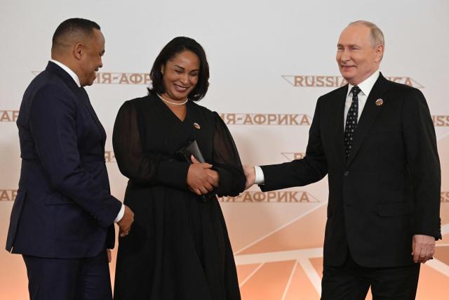 Russian President Vladimir Putin greets Madagascar's President Michael Randrianirina during a welcoming ceremony for participants of the Russia-Africa summit at the Grand Kremlin Palace in central Moscow on October 28, 2026. (Photo by Igor IVANKO / POOL / AFP)