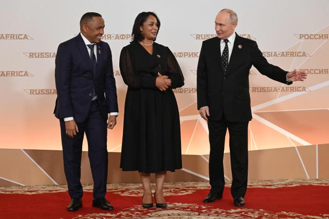 Russian President Vladimir Putin greets Madagascar's President Michael Randrianirina during a welcoming ceremony for participants of the Russia-Africa summit at the Grand Kremlin Palace in central Moscow on October 28, 2026. (Photo by Igor IVANKO / POOL / AFP)