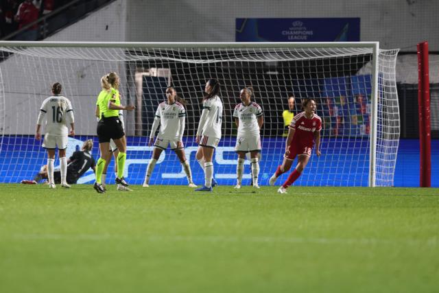 Bayern Munich's Japanese midfielder #18 Momoko Tanikawa (R) celebrates after scoring the 2-2 equalizing goal during the UEFA Women's Champions League - League phase, Matchday 3 - football match between FC Bayern Munich and Real Madrid in Unterhaching near Munich, southern Germany, on October 28, 2026. (Photo by Alexandra BEIER / AFP)