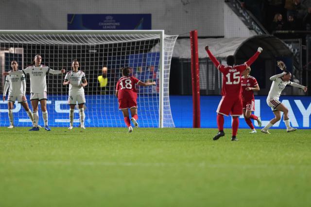 Bayern Munich's Japanese midfielder #18 Momoko Tanikawa (R) scores the 2-2 equalizing goal during the UEFA Women's Champions League - League phase, Matchday 3 - football match between FC Bayern Munich and Real Madrid in Unterhaching near Munich, southern Germany, on October 28, 2026. (Photo by Alexandra BEIER / AFP)