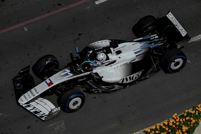 Cadillac F1 Team Mexican driver Sergio Perez drives during an exhibition at Reforma avenue ahead of the Mexican Formula 1 Grand Prix in Mexico City on October 28, 2026. (Photo by Alfredo ESTRELLA / AFP)