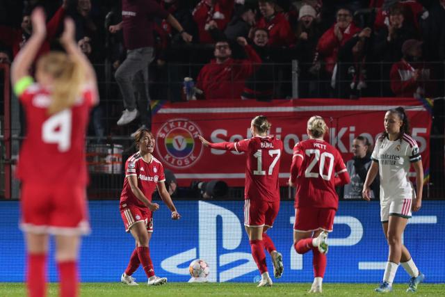 Bayern Munich's Japanese midfielder #18 Momoko Tanikawa (2nd L) celebrates with team mates after scoring the 2-2 equalizing goal during the UEFA Women's Champions League - League phase, Matchday 3 - football match between FC Bayern Munich and Real Madrid in Unterhaching near Munich, southern Germany, on October 28, 2026. (Photo by Alexandra BEIER / AFP)