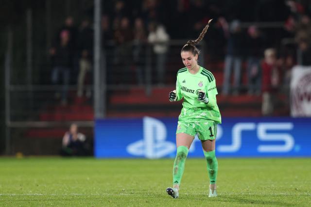 Bayern Munich's German goalkeeper #01 Ena Mahmutovic celebrates her teams equalizing goal during the UEFA Women's Champions League - League phase, Matchday 3 - football match between FC Bayern Munich and Real Madrid in Unterhaching near Munich, southern Germany, on October 28, 2026. (Photo by Alexandra BEIER / AFP)