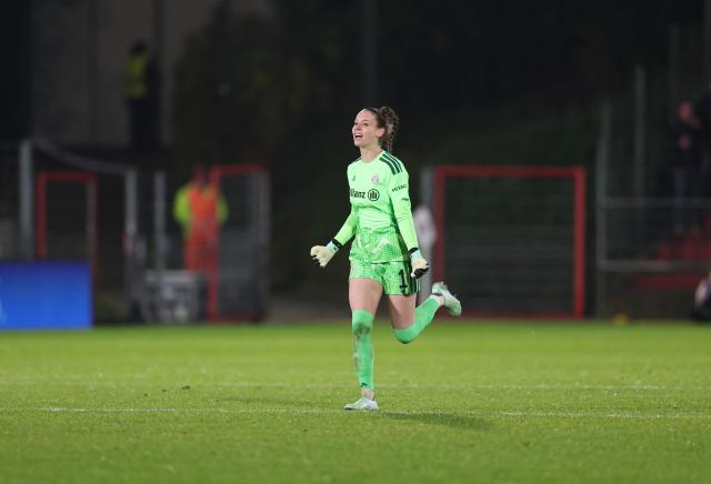 Bayern Munich's German goalkeeper #01 Ena Mahmutovic celebrates her teams equalizing goal during the UEFA Women's Champions League - League phase, Matchday 3 - football match between FC Bayern Munich and Real Madrid in Unterhaching near Munich, southern Germany, on October 28, 2026. (Photo by Alexandra BEIER / AFP)