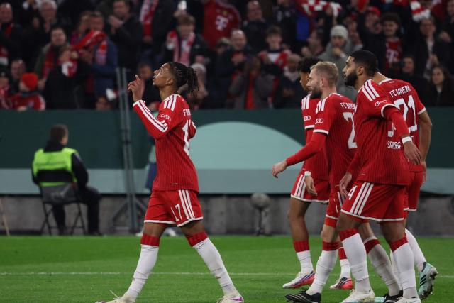 Bayern Munich's French forward #17 Michael Olise (R) celebrates after scoring the opening 1-0 goal during the German Cup (DFB-Pokal) football match between FC Bayern Munich and 1. FC Magdeburg in Munich, southern Germany on October 28, 2026. (Photo by Karl-Josef HILDENBRAND / AFP) / DFB REGULATIONS PROHIBIT ANY USE OF PHOTOGRAPHS AS IMAGE SEQUENCES AND QUASI-VIDEO.
