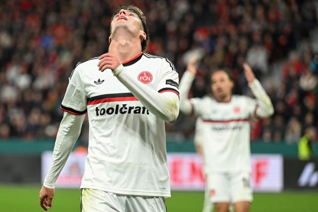 Nuremberg's Spanish midfielder #08 Javier Fernandez reacts during the German Cup (DFB-Pokal) football match between Bayer 04 Leverkusen and FC Nuernberg in Leverkusen, western Germany on October 28, 2026. (Photo by INA FASSBENDER / AFP) / DFB REGULATIONS PROHIBIT ANY USE OF PHOTOGRAPHS AS IMAGE SEQUENCES AND QUASI-VIDEO.