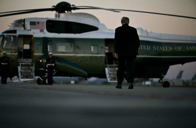 US President Donald Trump walks to Marine One at Rickenbacker International Airport in Columbus, Ohio on October 28, 2026. President Trump is travelling to Ohio to speak at a midterm campaign rally. (Photo by Kent NISHIMURA / AFP)