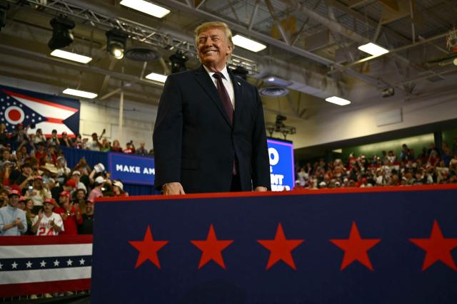 US President Donald Trump greets supporters upon arrival to speak at a midterm campaign rally at Shoemaker Center in Chillicothe, Ohio, on October 28, 2026. (Photo by Kent NISHIMURA / AFP)
