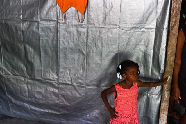 A child is seen in a displaced persons camp, in Port-au-Prince, Haiti, on October 28, 2026. (Photo by Clarens SIFFROY / AFP)
