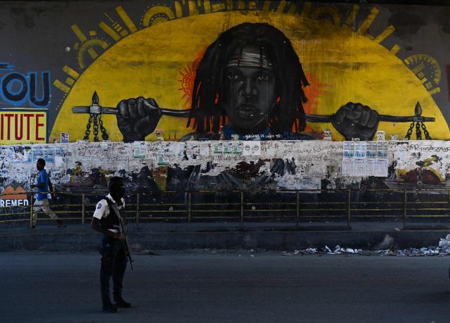 A police officer patrols in the Delmas neighborhood of Port-au-Prince, Haiti, on October 28, 2026. (Photo by Clarens SIFFROY / AFP)