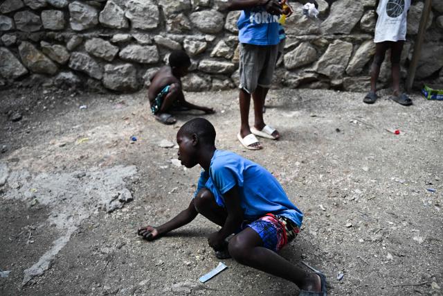 Children play in a displaced persons camp in Port-au-Prince, Haiti, on October 28, 2026. (Photo by Clarens SIFFROY / AFP)