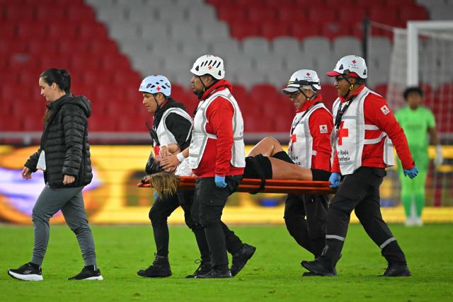 Olimpia's forward #21 Erika Cartaman leaves the pitch during the 2026 Women's Copa Libertadores semi-final football match between Brazil's Cruzeiro and Paraguay's Olimpia at the Rodrigo Paz Delgado stadium in Quito on October 28, 2026. (Photo by Rodrigo BUENDIA / AFP)