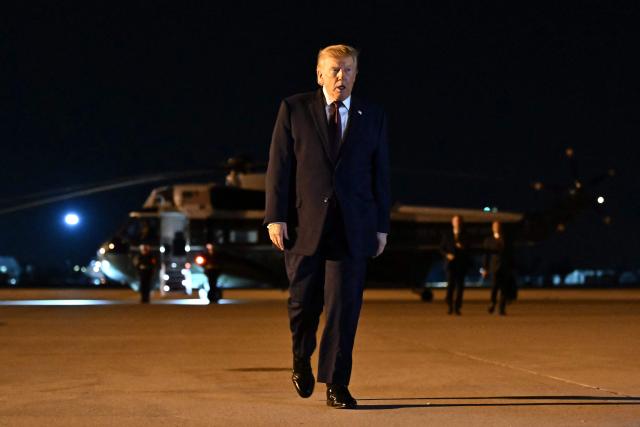US President Donald Trump walks to board Air Force One at Rickenbacker International Airport in Columbus, Ohio, on October 28, 2026. President Trump is returning to Washington, DC, after holding at a midterm campaign rally. (Photo by Kent NISHIMURA / AFP)