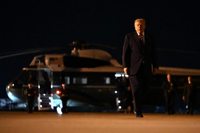 US President Donald Trump walks to board Air Force One at Rickenbacker International Airport in Columbus, Ohio, on October 28, 2026. President Trump is returning to Washington, DC, after holding at a midterm campaign rally. (Photo by Kent NISHIMURA / AFP)