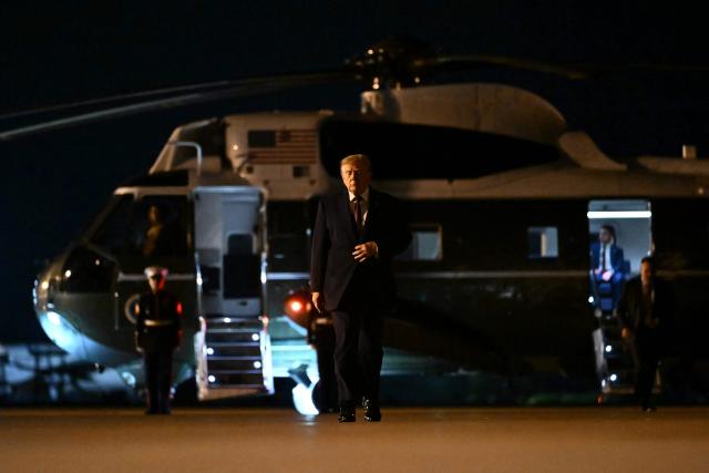 US President Donald Trump walks to board Air Force One at Rickenbacker International Airport in Columbus, Ohio, on October 28, 2026. President Trump is returning to Washington, DC, after holding at a midterm campaign rally. (Photo by Kent NISHIMURA / AFP)