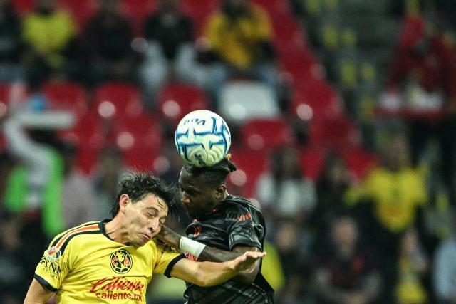 America's midfielder #20 Alexis Gutierrez and Tijuana's Ecuadorian defender #12 Jackson Porozo fight for the ball during the Liga MX Apertura tournament football match between America and Tijuana at the Banorte stadium in Mexico City on October 25, 2026. (Photo by YURI CORTEZ / AFP)
