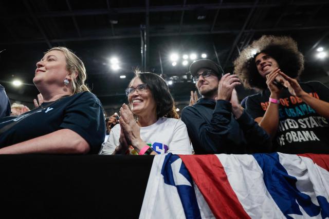 Supporters cheer as US Senator Jon Ossoff (D-GA) and Democrat gubernatorial candidate Keisha Lance Bottoms speak at a midterm campaign rally in Morrow, Georgia, on October 28, 2026. (Photo by ERIK S. LESSER / AFP)