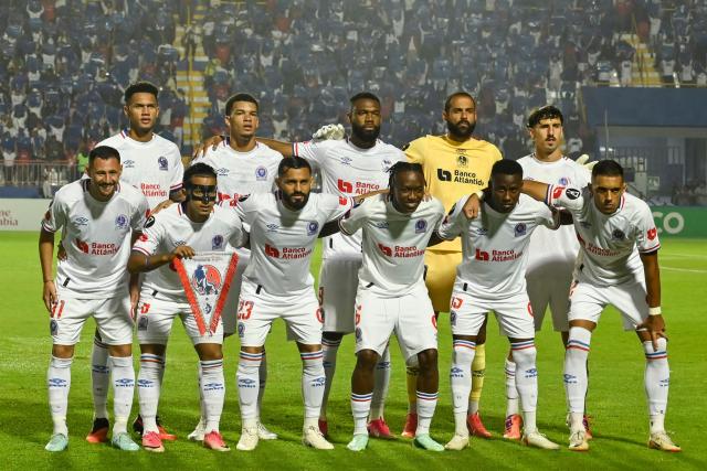Olimpia's players pose for a team photo ahead of the 2026 Concacaf Central American Cup second leg semifinal football match between Honduras' Olimpia and Costa Rica's CS Cartagines, at the Chelato Ucles National Stadium in Tegucigalpa on October 29, 2026. (Photo by Orlando SIERRA / AFP)