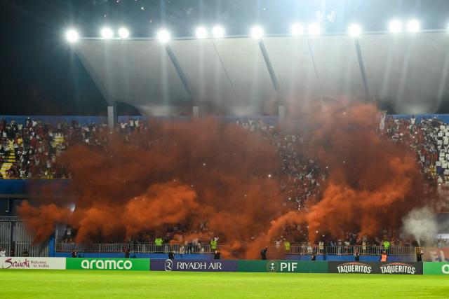 Olimpia's fans cheer their team ahead of the 2026 Concacaf Central American Cup second leg semifinal football match between Honduras' Olimpia and Costa Rica's CS Cartagines, at the Chelato Ucles National Stadium in Tegucigalpa on October 29, 2026. (Photo by Orlando SIERRA / AFP)