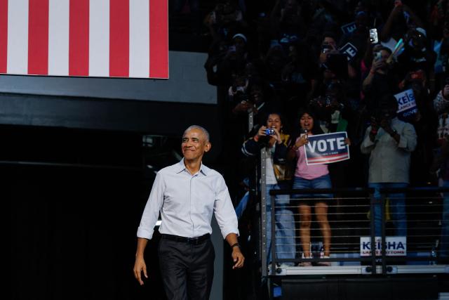 Former US President Barack Obama walks out to speak at a midterm campaign rally in support of US Senator Jon Ossoff's (D-GA) reelection campaign in Morrow, Georgia, on October 28, 2026. (Photo by ERIK S. LESSER / AFP)