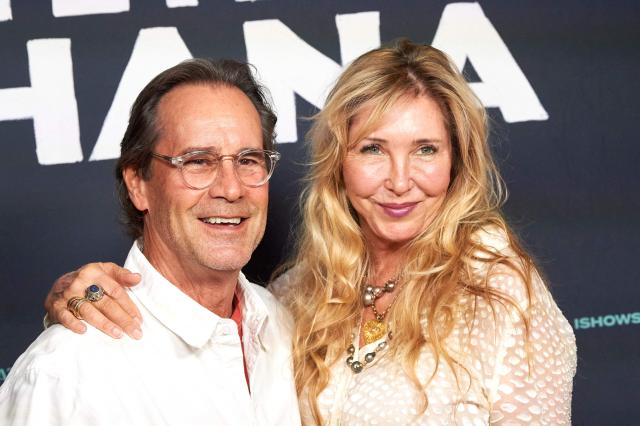 Scott Smith and Alexia Loehde attend "The Eyes of Ghana" premiere at AMC Citywalk in Universal City, California on October 28, 2026. (Photo by Unique Nicole / AFP)