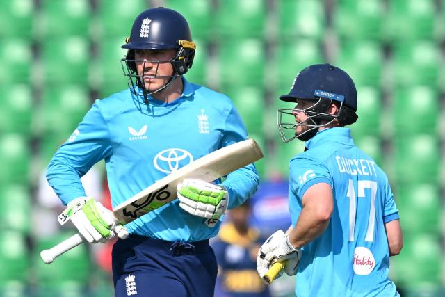 England's Tom Banton (L) and Ben Duckett (R) run between the wickets during the one-day international (ODI) tri-series cricket match between England and Sri Lanka at the Gaddafi stadium in Lahore on October 29, 2026. (Photo by ARIF ALI / AFP)
