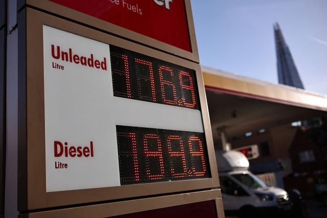 (FILES) The price per litre of unleaded petrol and diesel fuels, with diesel at just under two GBP pounds sterling per litre, is displayed on sign outside a Shell petrol station in London on October 2, 2026. British energy giant Shell said on October 29, 2026 that its net profit more than doubled to $12.1 billion in the third quarter as the Middle East war disrupted supplies and sent oil and gas prices soaring. The company had posted profit after tax of $5.3 billion in the third quarter of 2025. (Photo by Henry Nicholls / AFP)