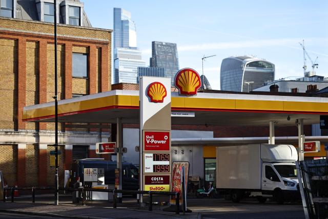 (FILES) The price per litre of unleaded petrol and diesel fuels, with diesel at just under two GBP pounds sterling per litre, is displayed on sign outside a Shell petrol station in London on October 2, 2026. British energy giant Shell said on October 29, 2026 that its net profit more than doubled to $12.1 billion in the third quarter as the Middle East war disrupted supplies and sent oil and gas prices soaring. The company had posted profit after tax of $5.3 billion in the third quarter of 2025. (Photo by Henry NICHOLLS / AFP)