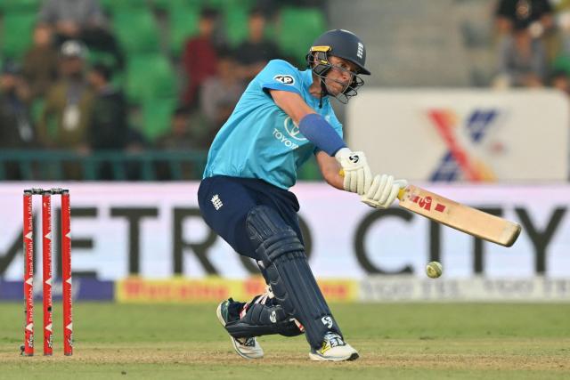 England's Sam Curran plays a shot during the one-day international (ODI) tri-series cricket match between England and Sri Lanka at the Gaddafi stadium in Lahore on October 29, 2026. (Photo by ARIF ALI / AFP)