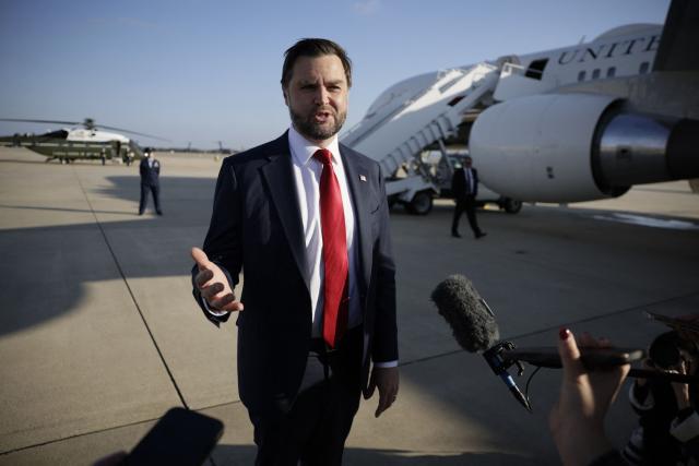 US Vice President JD Vance speaks to the media before boarding Air Force Two at Joint Base Andrews, Maryland on October 29, 2026. Vance is travelling to a midterm campaign rally Texas. (Photo by Evan Vucci / POOL / AFP)
